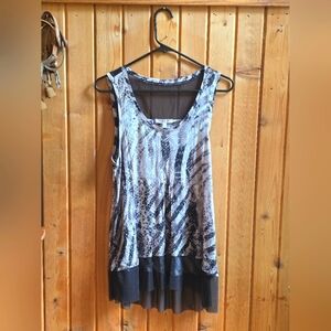Jennifer Lopex Black and White Sleeveless Top With Mesh Accents